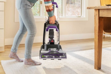 Lifting and moving machine across room