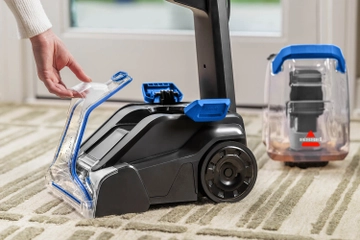 Removing nozzle from foot of machine