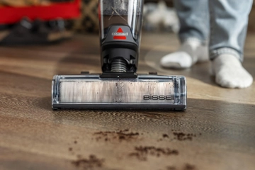 CrossWave mopping and vacuuming dirt from sealed hard floors