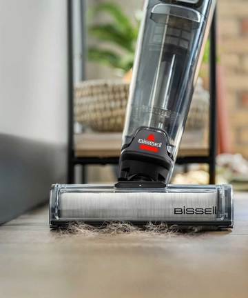 CrossWave OmniForce All-in-One Multi-Surface Cleaner vacuuming pet hair from hard flooring