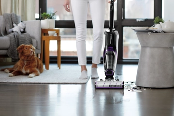 CrossWave Cordless Max Multi-Surface Wet Dry Vac mopping and vacuuming spilled mess on tile flooring
