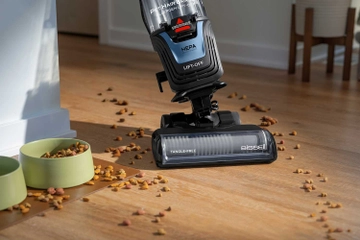 vacuuming dog food from hard flooring