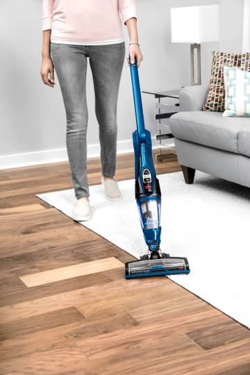 Using Fingertip Controls to adjust to vacuuming on hard flooring