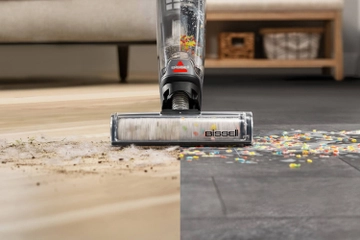 CrossWave vacuuming and mopping multiple hard surfaces