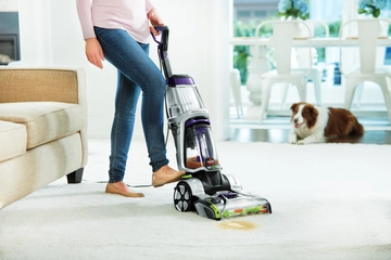 ProHeat 2X Pet Revolution using cleanshot pretreater to spray pet accident on carpet.