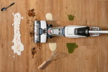 vacuuming and mopping several spills on hard flooring