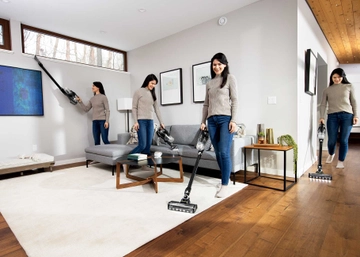 Using ICONPET TURBO Cordless Stick Vac to vacuum above floors, couch cushions, and area rug.