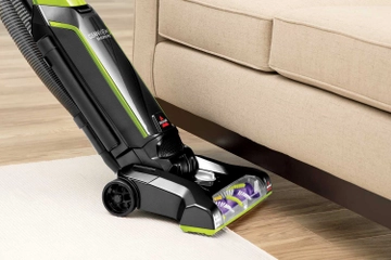 Moving CleanView Bagged Vacuum from carpet to hard floors.